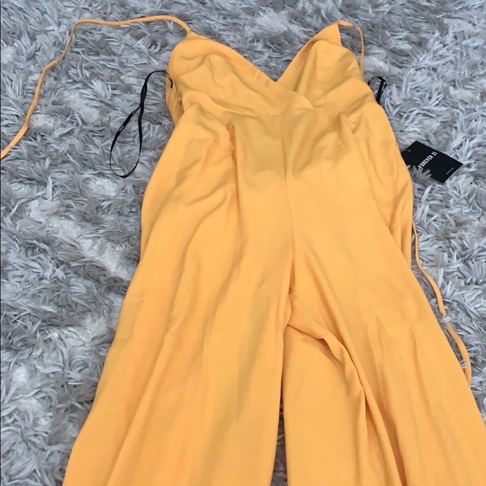 Yellow pant jumpsuit.